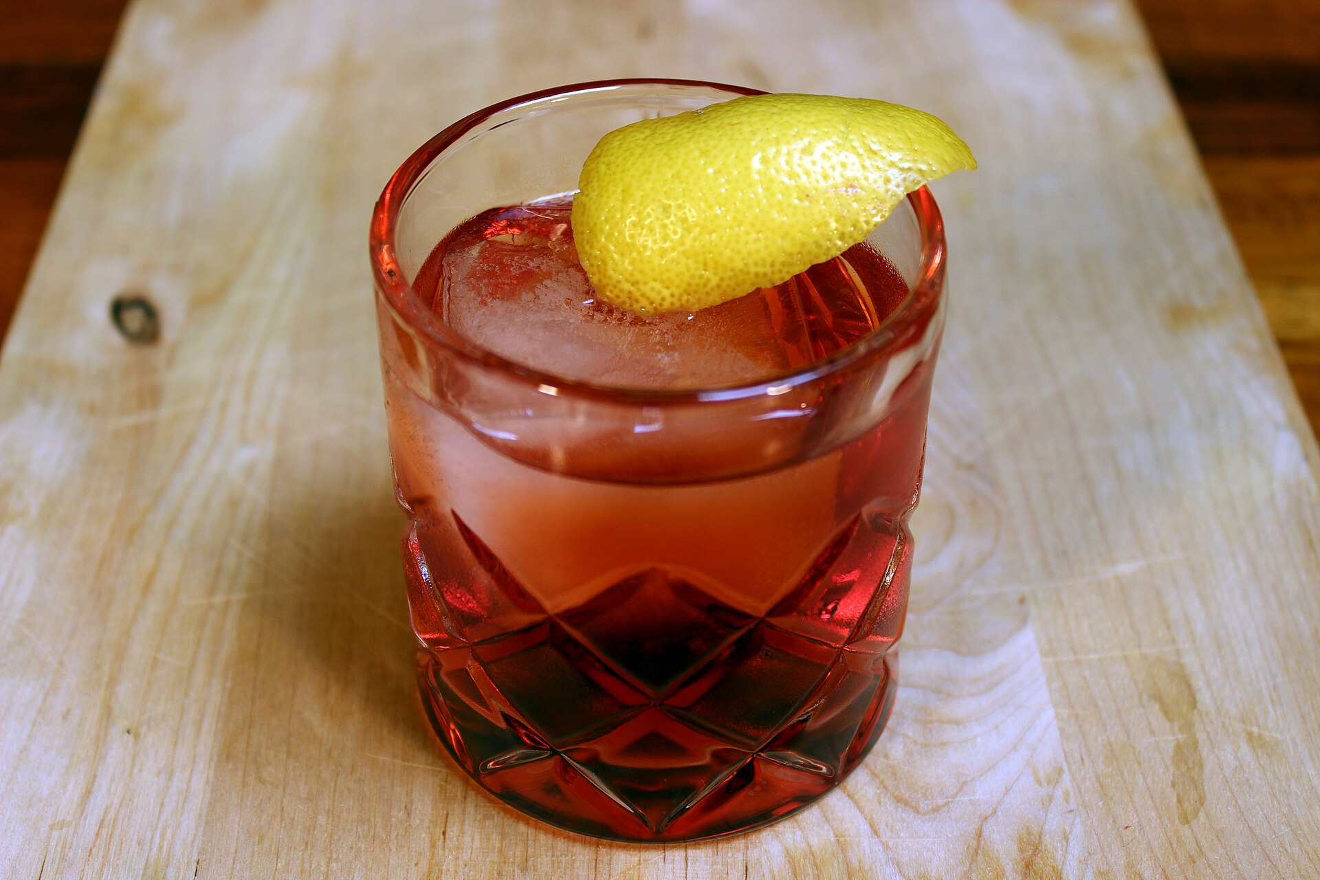 A Negroni on the rocks with an orange twist